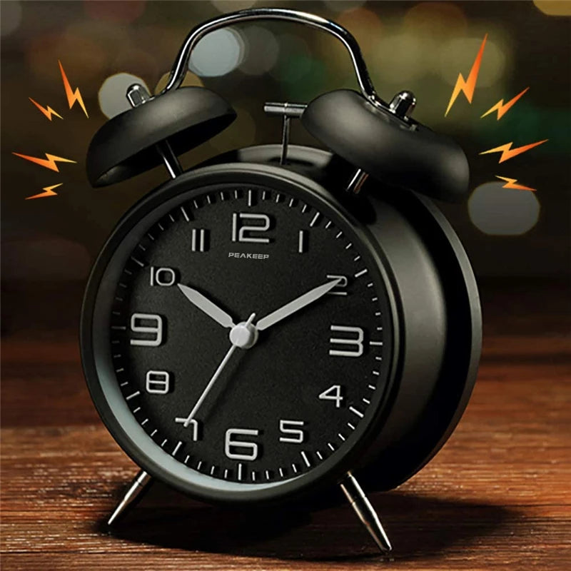 Classic analog alarm clock with twin bells and silent sweep movement
