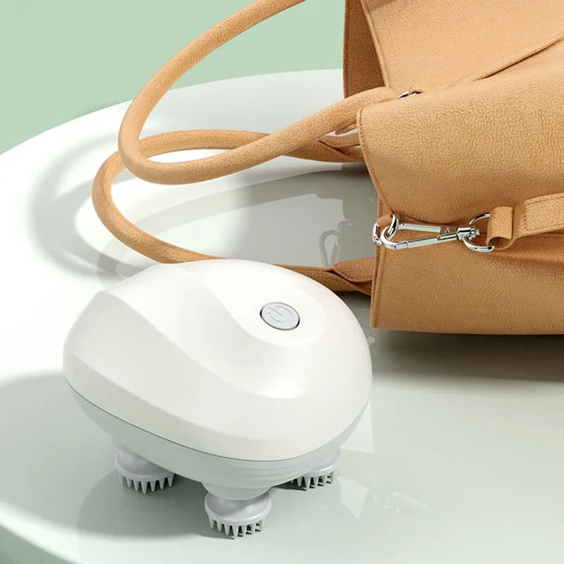 Person using electric scalp massager on neck and shoulders