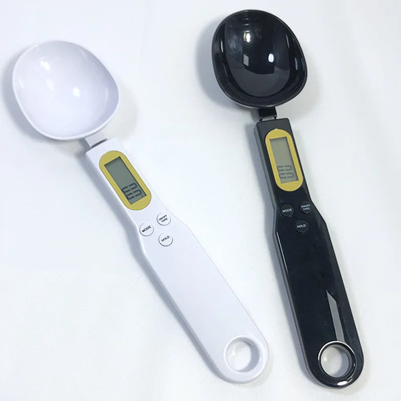 Electronic spoon scale showing dual unit measurement grams and ounces
