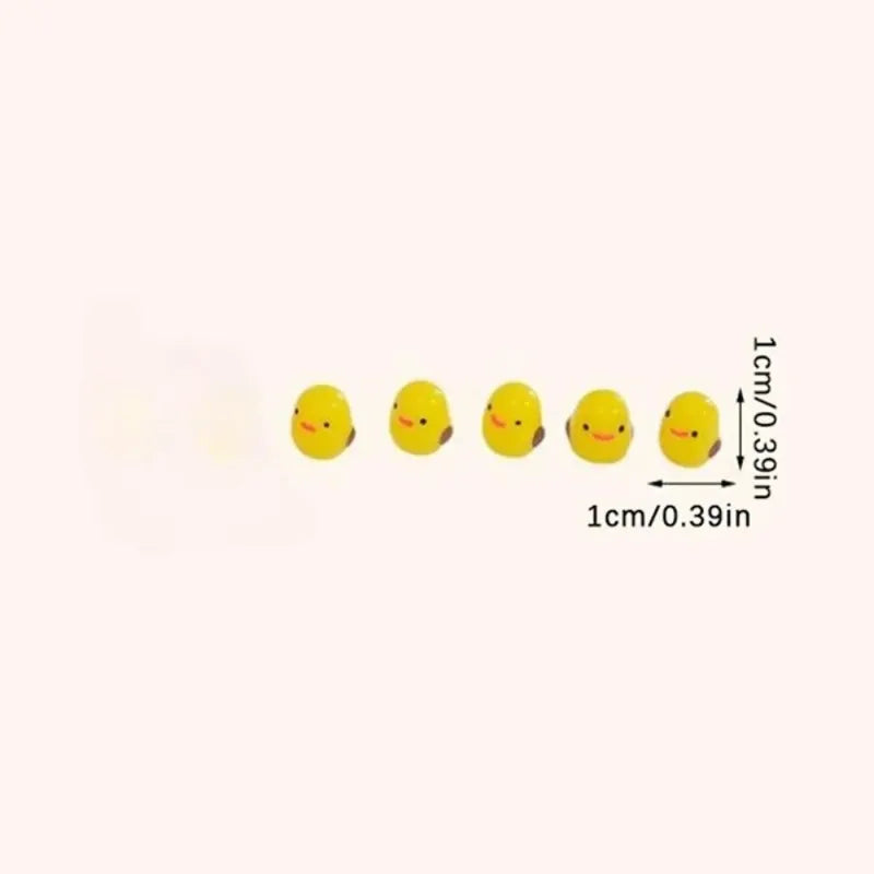 Bright yellow mini duck figurines for car and home decor