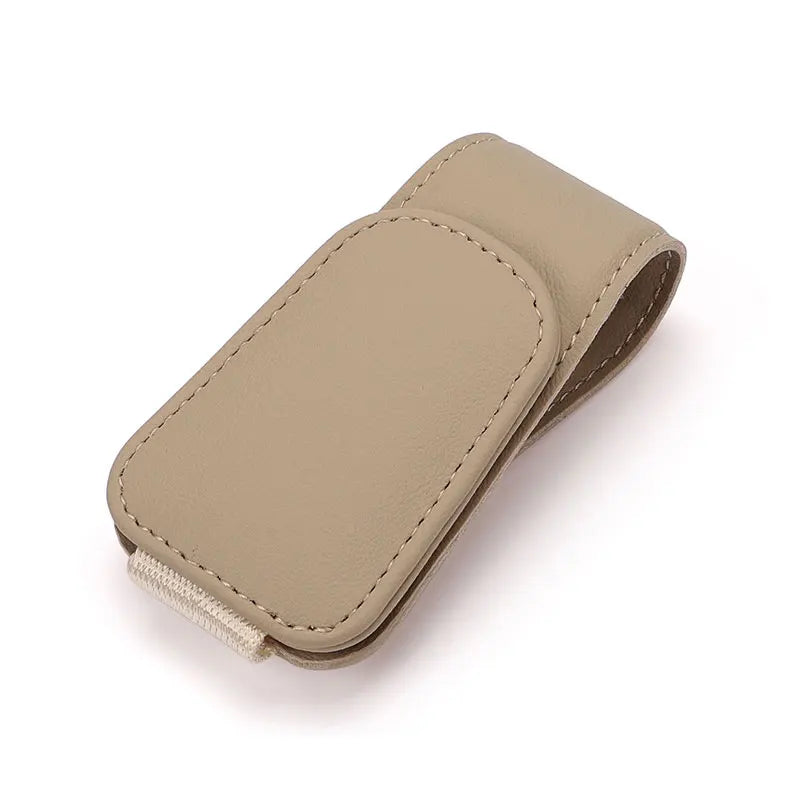 Sun visor glasses holder freeing up cup holder space