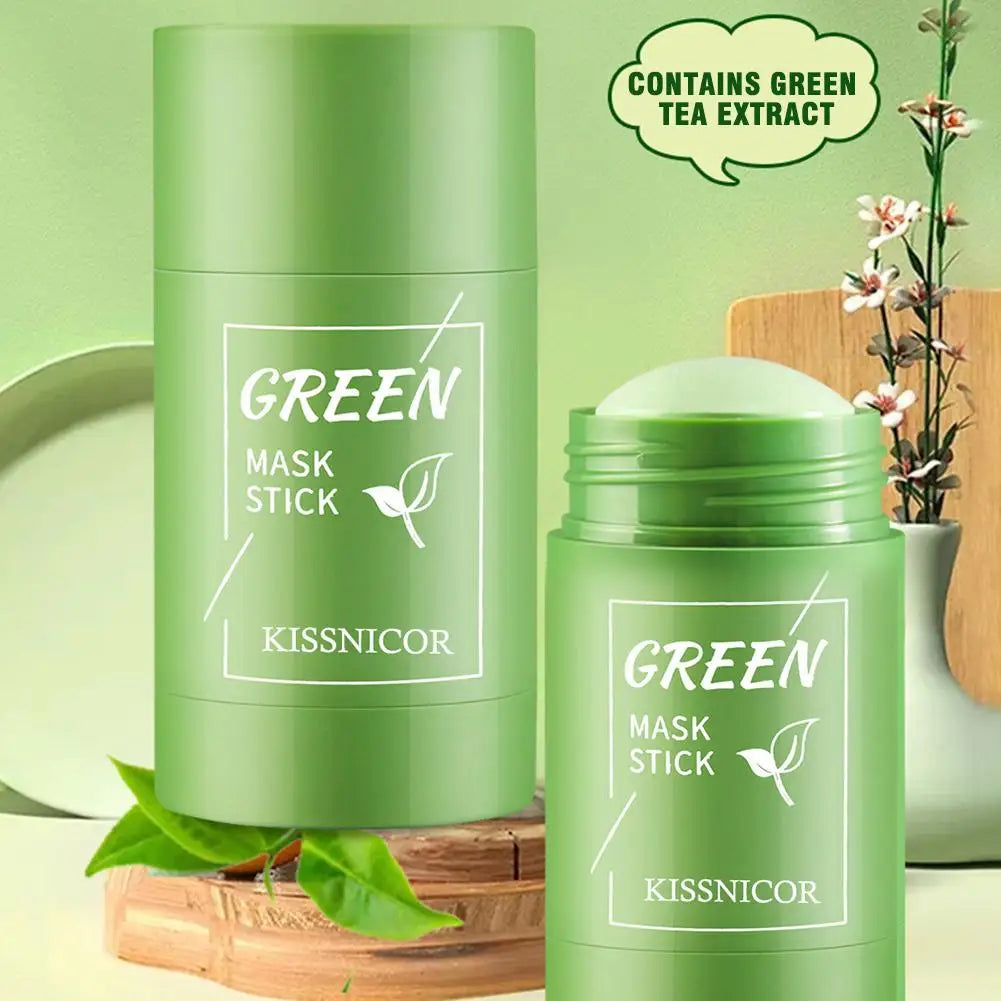 Close-up of green tea mask stick texture showing smooth mud formulation

