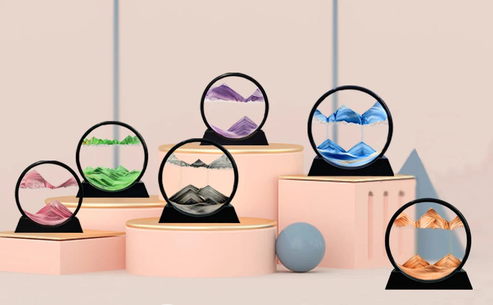 Round glass sand art hourglass on desk for stress relief
