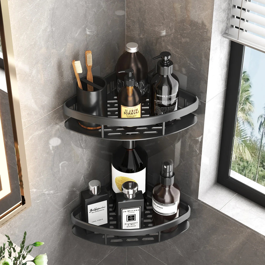 Silver wall-mounted corner bathroom shelf installed in shower with shampoo bottles